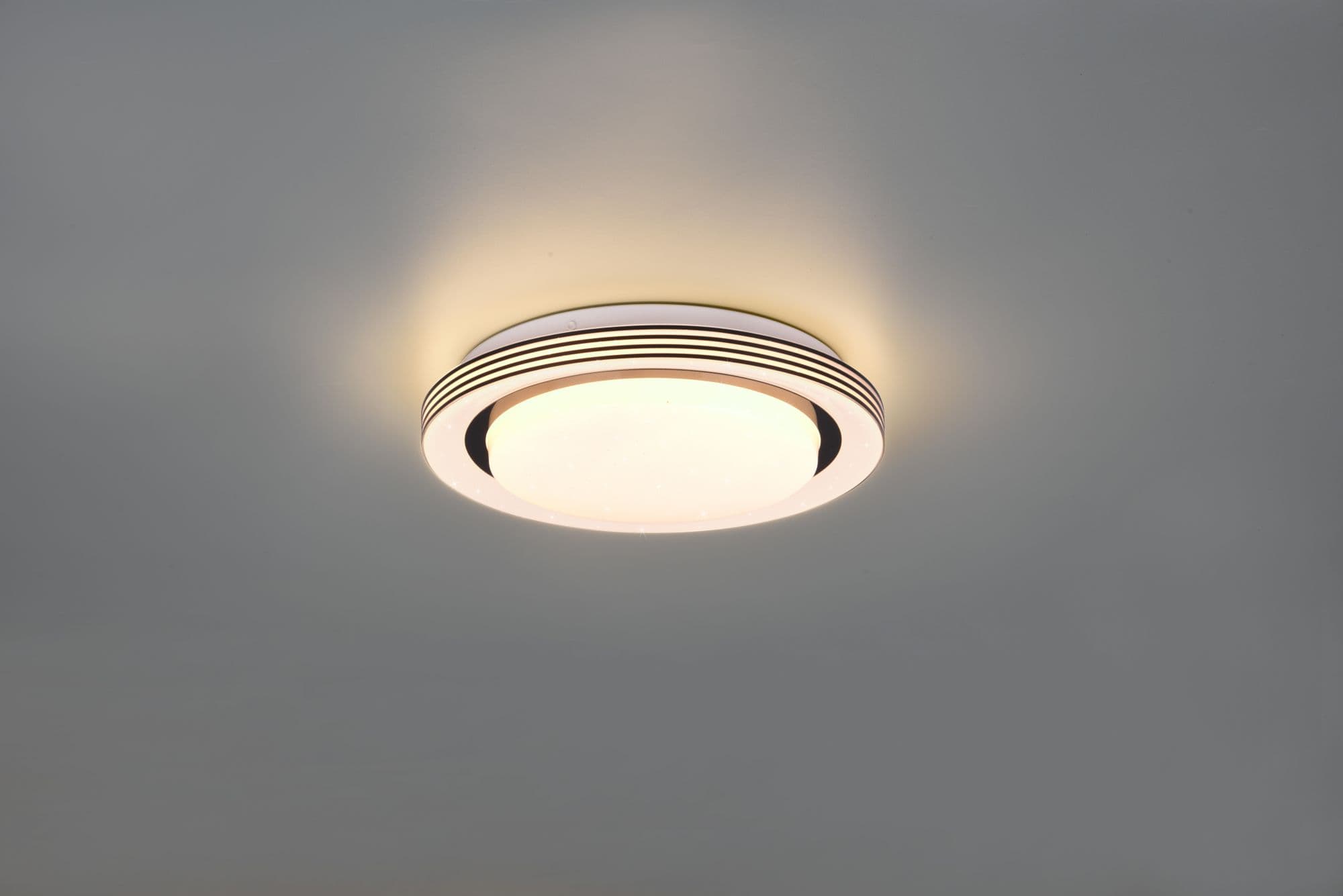 ATRIA PLAFONIERA LED 10,5W 1080lm, 3000 - 6000K BORDO NERO CON TELECOMANDO MULTIFUNZIONE CON DIFFUSORE EFFETTO CIELO STELLATO D.27CM DIMMERABILE